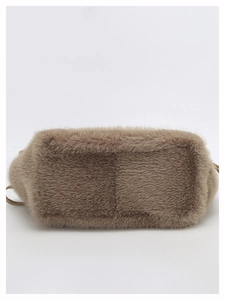 Detail shot of brown plush faux fur crossbody bag showing soft texture and shoulder strap