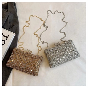 Detail of silver and gold rhinestone evening bags with sparkling geometric crystals