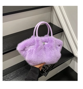 Detailed macro view of lavender faux fur tote bag with metal buckle and leather handle