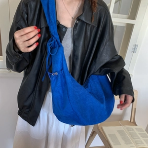 Royal blue slouchy hobo bag with drawstring and adjustable metal strap for women