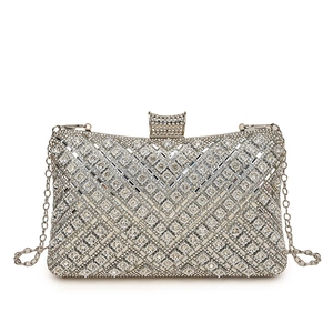 Elegant silver rectangle clutch bag with V-shaped rhinestone patterns and chain strap