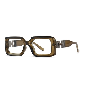 Occhiali quadrati vintage ambra anti-luce blu con dettagli metallici sulle stanghette