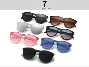 Detailed grid showing seven color options for oversized rivet rimless sunglasses