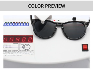 Detail view of large frame sunglasses undergoing professional UV400 protection testing