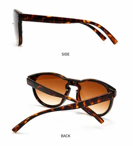 Detailansicht der übergroßen Tortoise-Sonnenbrille mit braunen Verlaufsgläsern und Nieten