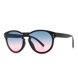 Oversized gradient blue and pink sunglasses with black frame and silver rivets