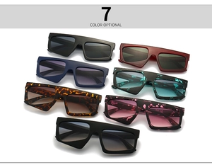 Macro shot of oversized geometric sunglasses showcasing seven unique color and texture options