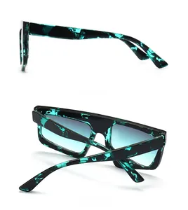 Flat top square sunglasses with blue marble frames and gradient lenses shown in side and back views