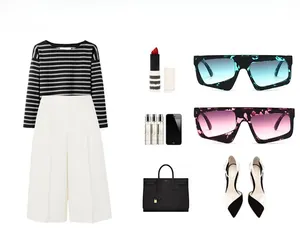 Flat lay of women's fashion outfit with striped tee, white trousers and stylish accessories