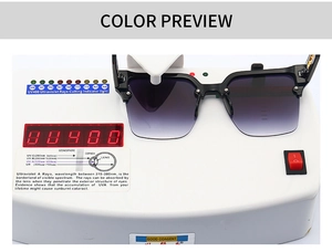 Black square frame sunglasses with purple gradient lenses undergoing UV400 testing