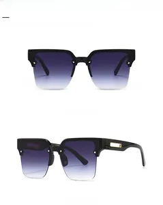 Detailed front and side view of oversized square sunglasses with metal rivets and gradient lens