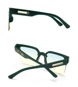 Side and back view of dark green sunglasses with gradient lenses and gold temple accents