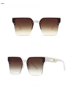Detailed front and side view of white frame sunglasses with brown gradient lenses
