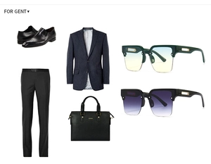 Flat lay of navy pinstripe blazer, trousers, leather brogues, bag and gradient sunglasses