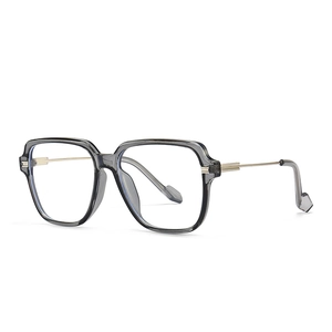 Fashionable oversized square grey eyewear frame with premium gold metal temples on white background