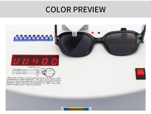 Detailed UV400 protection test showing black square sunglasses on a digital testing device
