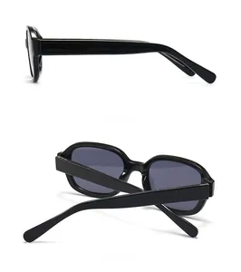 Side and top view of retro thick black frame sunglasses with dark grey lenses