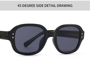 Detail view of black thick-frame sunglasses with grey lenses and double metal rivets