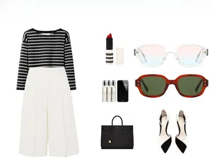Flat lay of modern women's fashion set featuring sunglasses and leather handbag