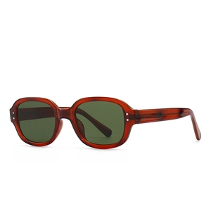 Retro tortoise rectangle sunglasses with dark green lenses and silver studs