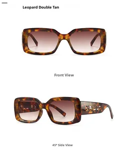 Detail view of square leopard print sunglasses with gradient lenses and metal temple logo