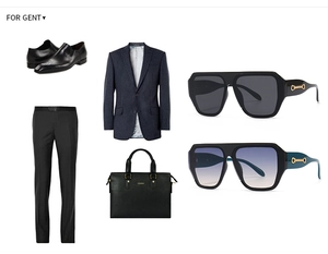 Détail de lunettes aviateur avec charnière mors doré et tenue d'affaires élégante
