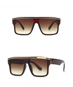 Flat top square sunglasses with tea gradient lenses and gold metal trim detailing