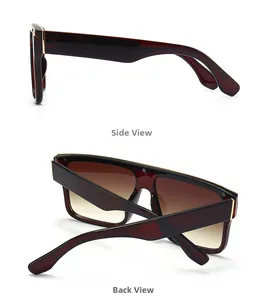 Detail view of tortoiseshell flat top sunglasses with gold metal accents on hinges