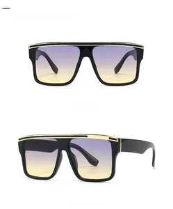 Front and side view of black oversized flat top sunglasses with gradient yellow lenses