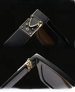 Détail de lunettes de soleil carrées noires avec charnière dorée et logo C chic