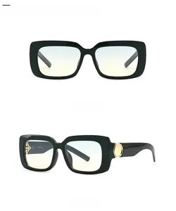 Front and side view of marble pattern sunglasses with green gradient lenses and gold accents