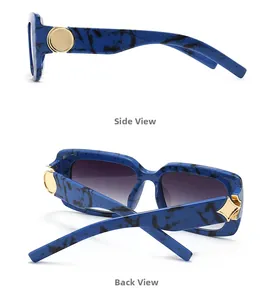 Detail view of blue marbled sunglasses showing side and back frames with gold accents