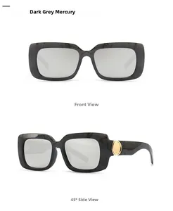 Detail of dark grey marble sunglasses with silver mirrored lenses and golden metal accents