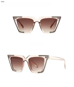 Front and side view of cat-eye sunglasses with champagne frames and brown gradient lenses