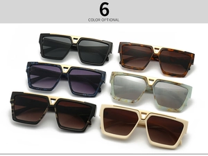 Flat lay of vintage square flat top sunglasses with metal V hardware in six colors