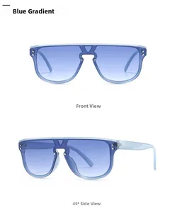 Detail of oversized shield sunglasses with blue gradient lenses and rivet accents