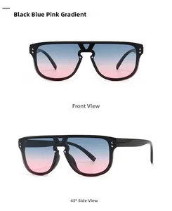 Detail of oversized black sunglasses with blue pink gradient lenses and metal studs