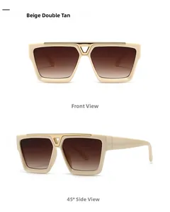 Detail view of beige square frame sunglasses with V-shaped metal gold accent and wide temples