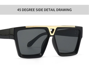 Detail view of large black square sunglasses featuring a signature gold metal V-shaped bridge