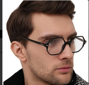 Detailed side view of black hexagonal eyewear frame with metal logo on high-quality temple