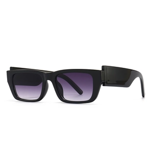 Retro small square black frame sunglasses with trendy purple gradient lenses on white backdrop