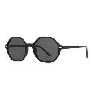 Classic black hexagonal frame sunglasses with silver rivets and dark grey lenses