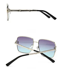 Vue détaillée des lunettes de soleil carrées rétro avec verres dégradés et branches en argent