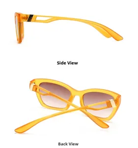 Detail view of orange sunglasses featuring hollowed-out temples and golden metal accents