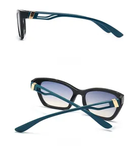 Detailed side and back view of cat-eye sunglasses with gold hinges and gradient lenses