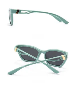 Detailed side and back view of mint green cat-eye sunglasses with gold metal temples