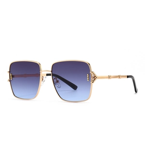 Lunettes de soleil carrées rétro avec monture dorée et verres dégradés bleu et violet