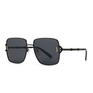Lunettes de soleil carrées rétro avec points dorés et verres gris foncé pour femme