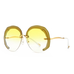 Retro oversized round sunglasses with yellow gradient lenses and gold metal frame