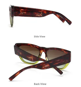 Detail view of tortoiseshell and yellow retro cat-eye sunglasses with gradient brown lenses